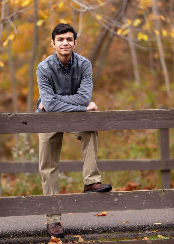 Alex posing for his senior picture